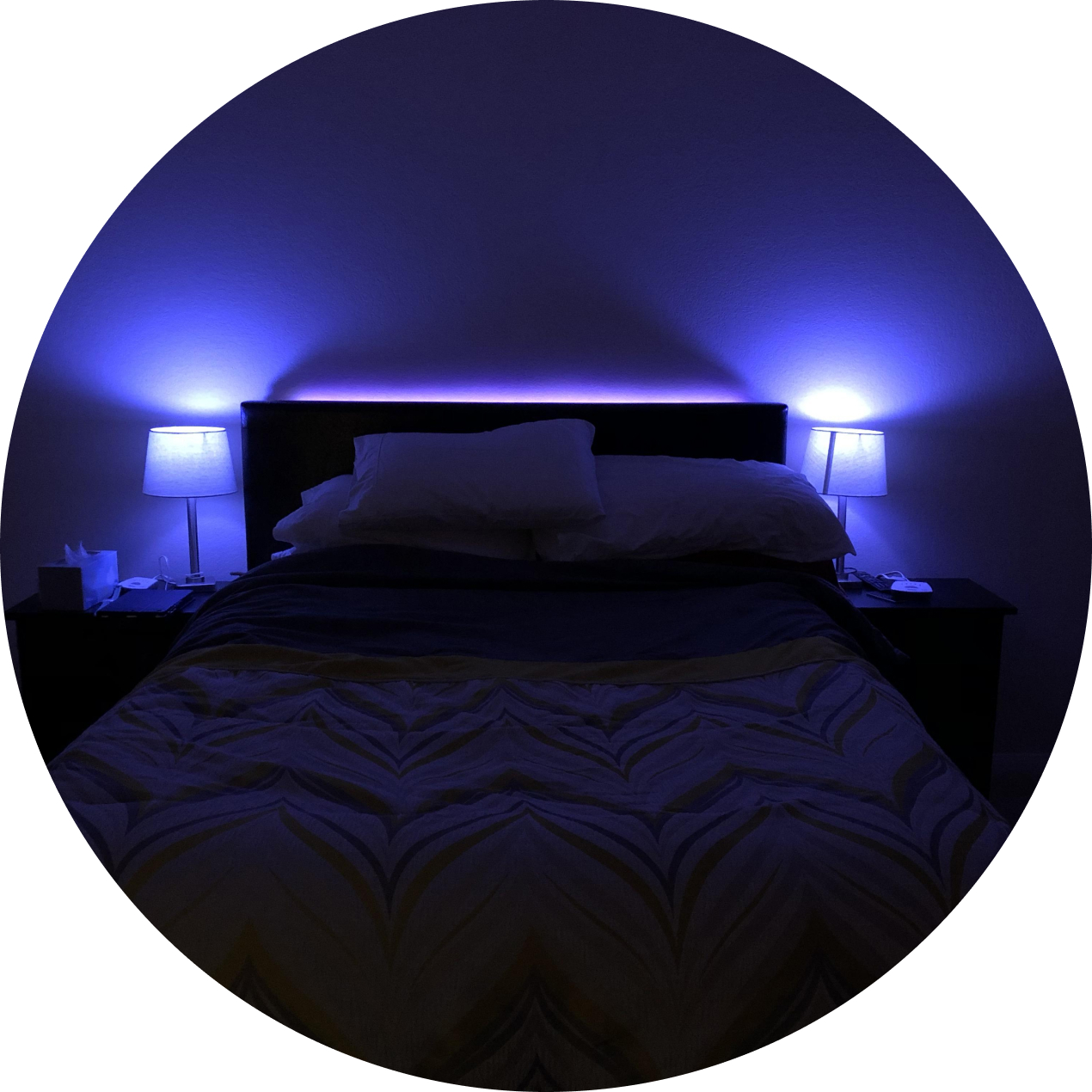 A bedroom lit with smart lighting